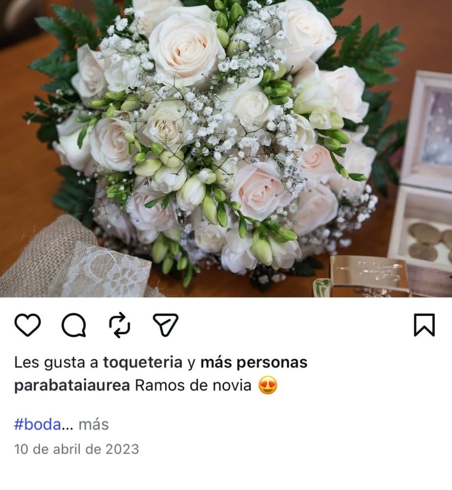 Ramo de novia con rosas blancas y flores silvestres